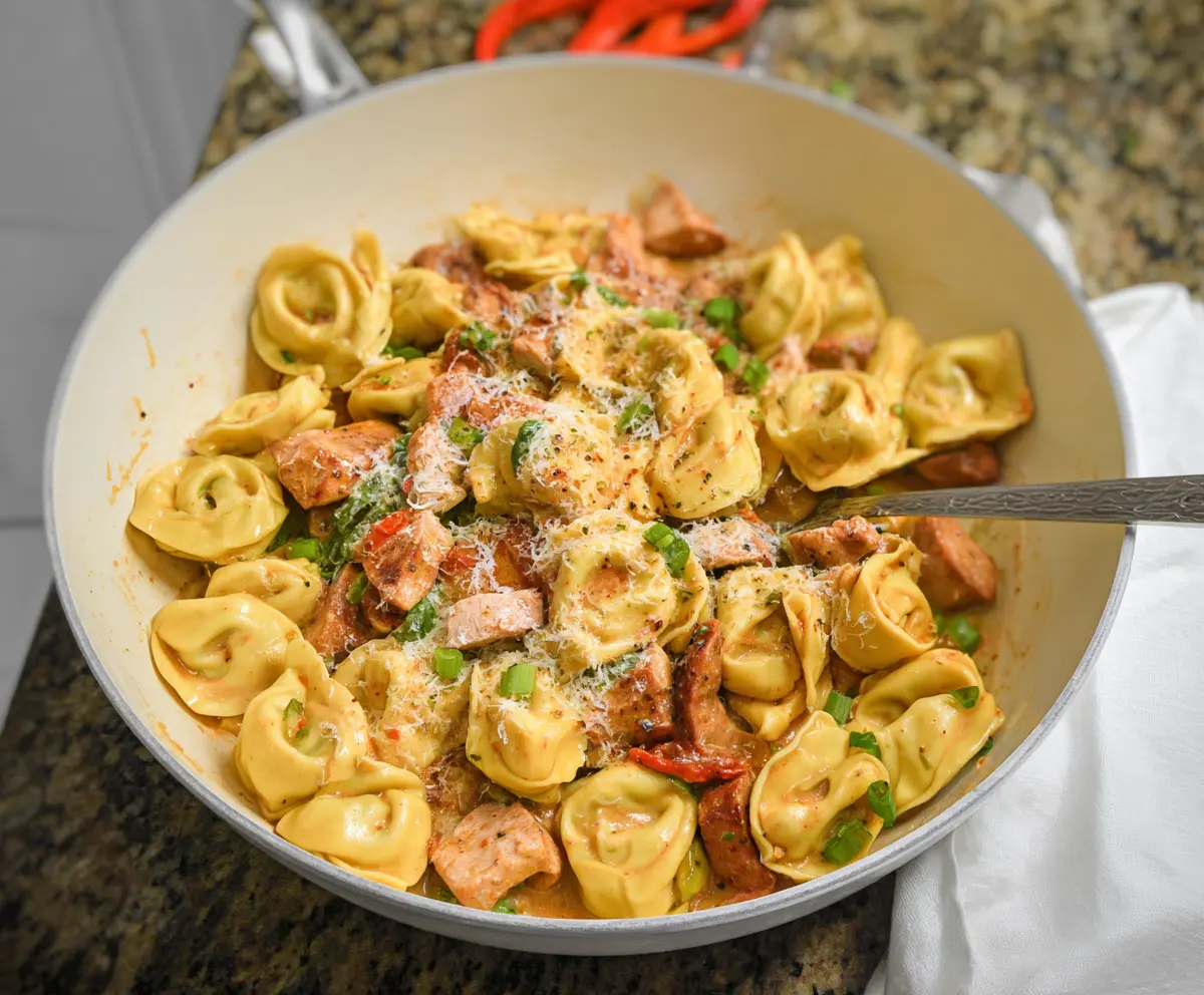Delicious Cajun Chicken Tortellini dish with creamy sauce and seasoned chicken pieces.