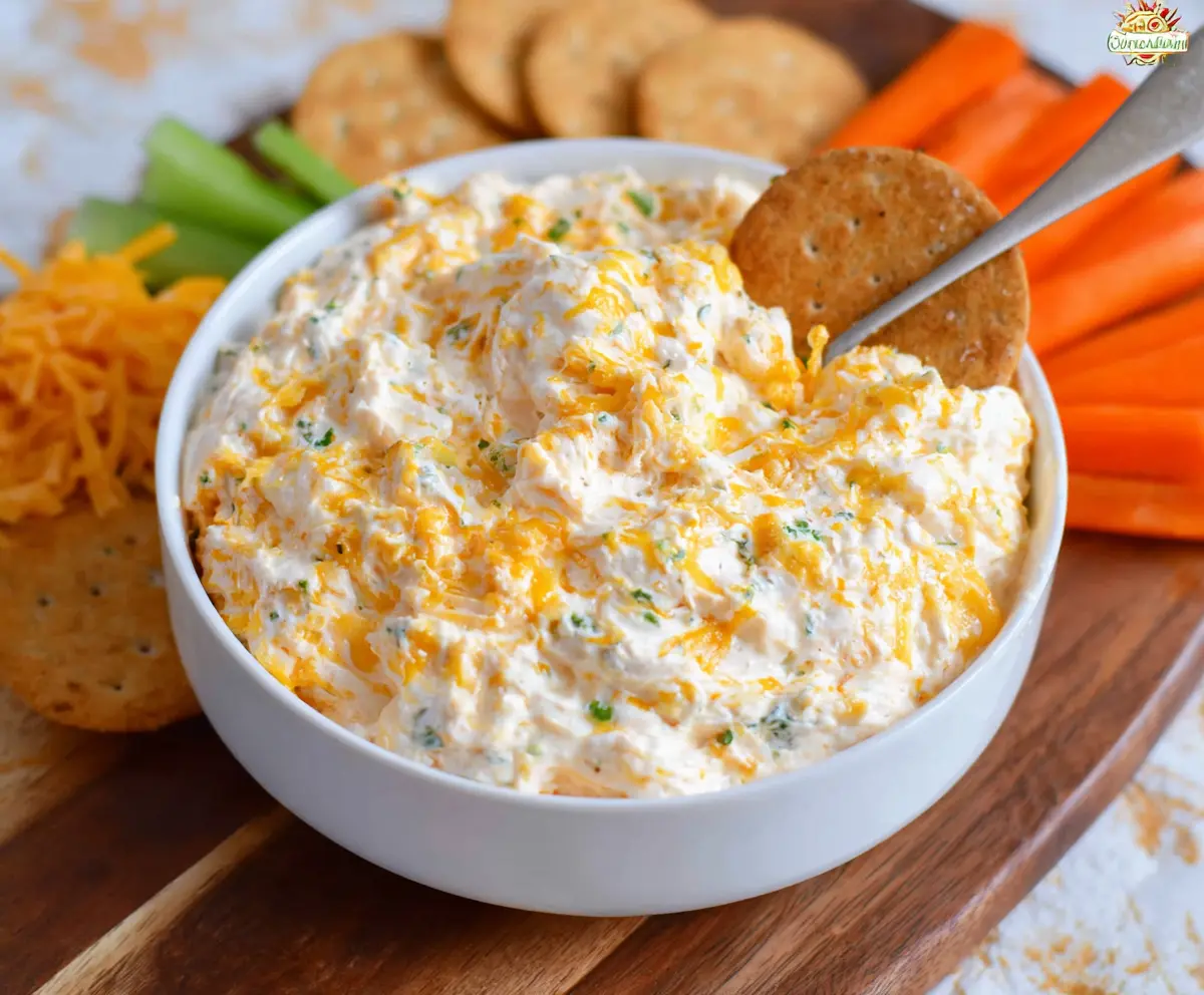 Creamy Cheddar Ranch Dip served with fresh vegetables, perfect for snacking.