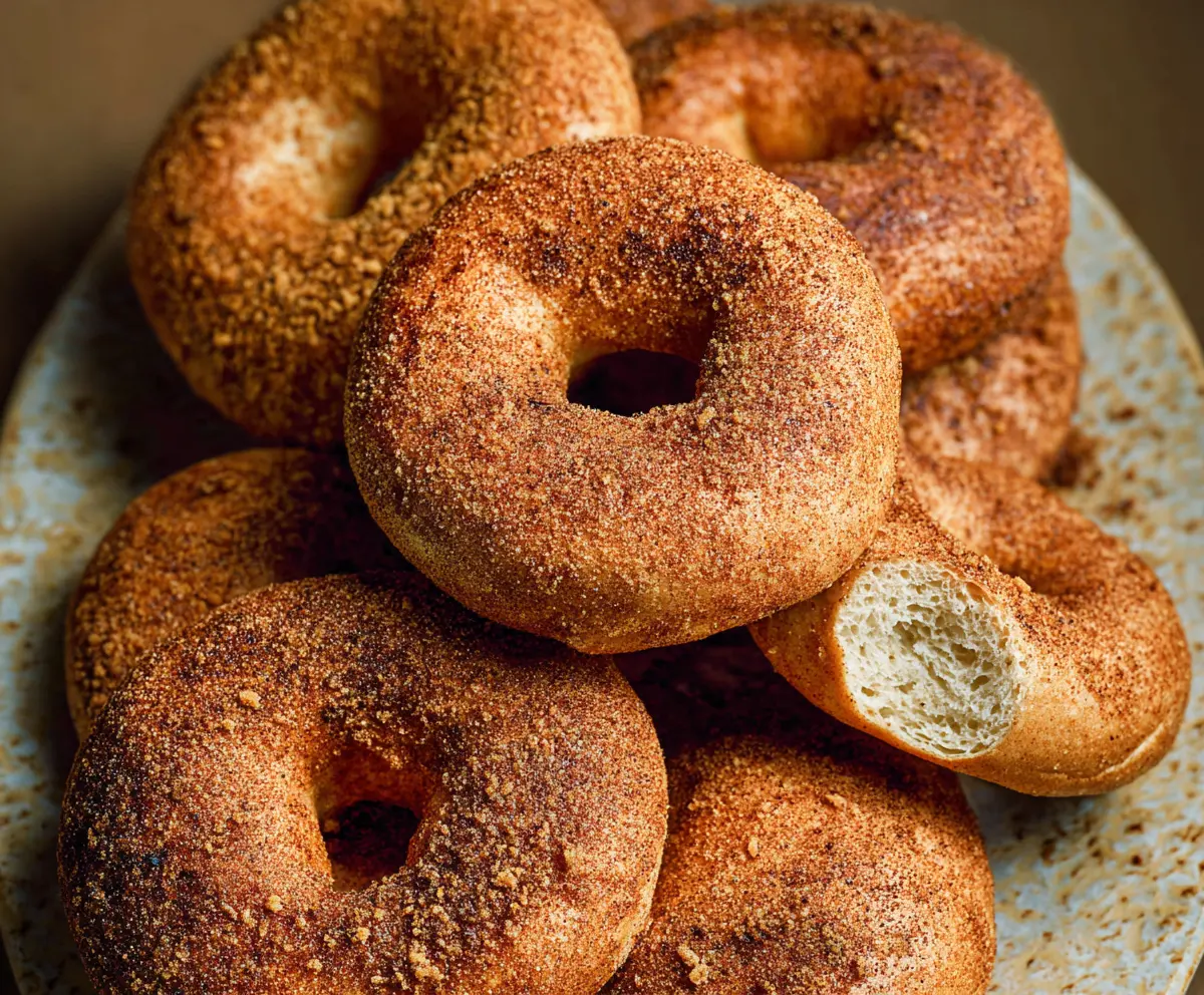 Golden cinnamon bagels topped with sugar and spice for a delicious breakfast.